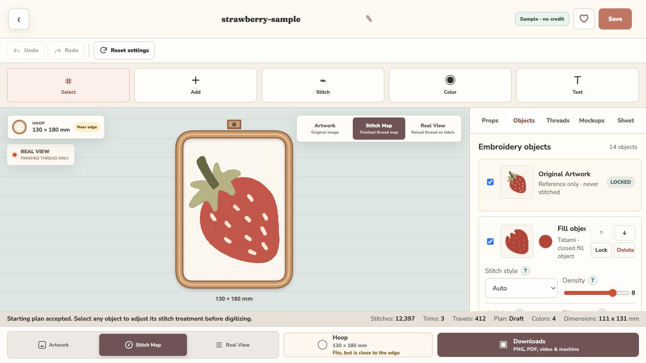 Studio editor with a strawberry sample in an embroidery hoop, artwork and stitch-map views, and individual object controls